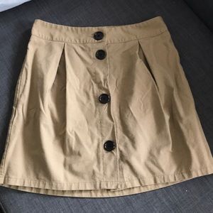 Beige short skirt